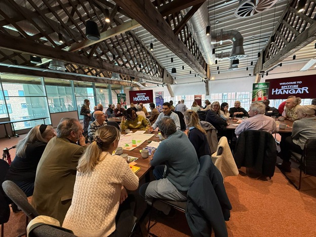 Teenagers gathered at the Spitfire Hangar to meet their MP